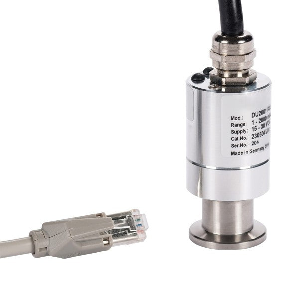 A close-up view of the Leybold North America DU 2001 rel. pressure -/+ 1000 mbar cylindrical sensor with a cable connected at the top. The sensor features a label displaying its technical specifications. Next to it is an Ethernet cable plug, with both items set against a plain white background.