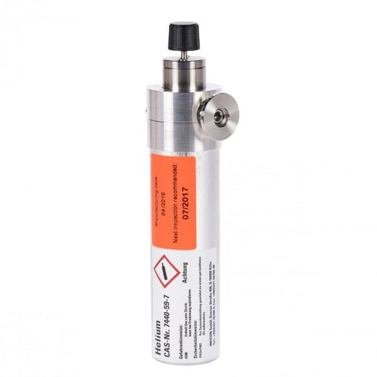 The TL 7 - Test Leak with Helium Gas Reservoir and Manual Valve by Leybold North America is a compact metal cylinder with a black knob, hazard symbols, leak testing warnings, and an orange inspection label for safe storage and use.