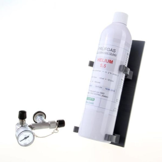 The Leybold North America TL 4-6 Test leak with Helium Gas Reservoir, shown wall-mounted with attached regulator and gauge, is pictured on a white background—perfect for leak testing and straightforward maintenance.
