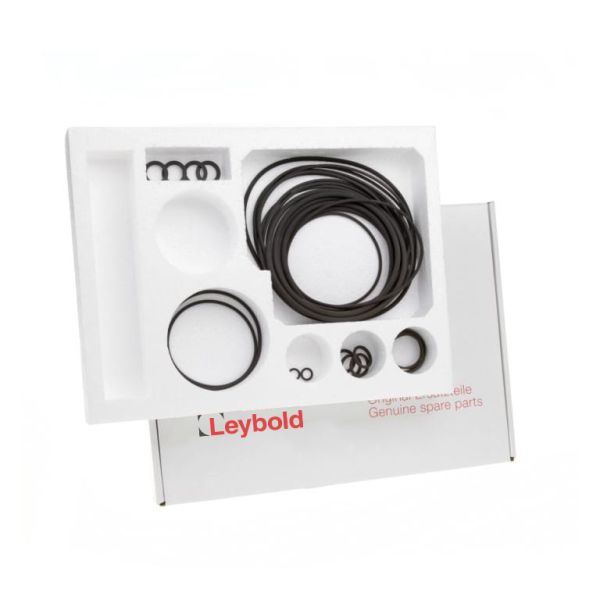 A white tray, containing various sizes of black O-rings, is placed on top of a partially visible white box labeled "Leybold North America Seal Kit RUVAC WS/WSU/WSLF 1001 - BR2." The tray has compartments neatly organizing the O-rings.