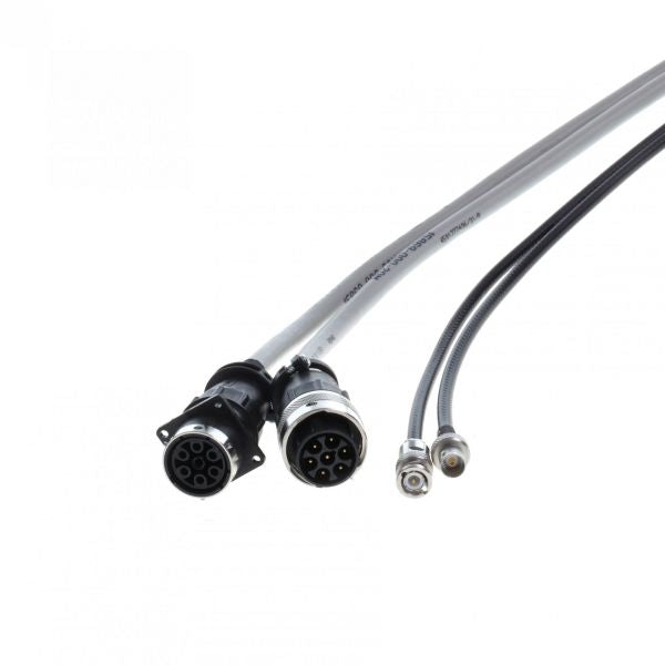 Close-up of two gray Extension for Connecting Cable IM 540 - IE 414 / IE 514 (20m) connectors by Leybold North America, featuring multi-pin circular designs of different sizes against a white background.