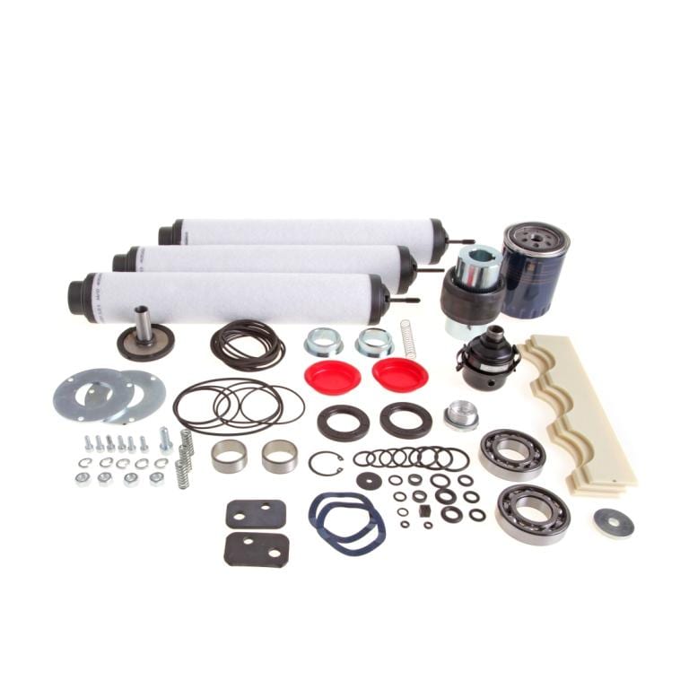 Displayed on a white background is an assortment of car engine parts from the Leybold North America Repair Kit SV300 B, featuring filters, gaskets, screws, and seals. The kit is designed for efficient repairs with its durable construction and includes red components that stand out among the predominantly metallic and black items.