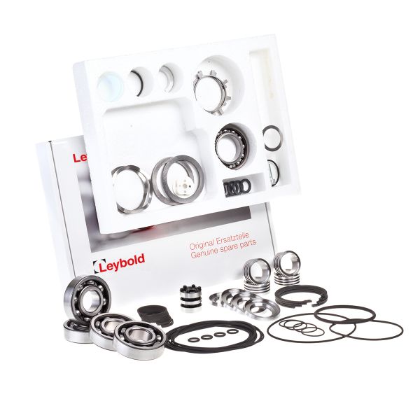 This Major Maintenance Kit for the RUVAC WS 501 vacuum system from Leybold North America includes a selection of metal bearings and seals, presented within a branded Leybold box. The kit features circular and ring-shaped components, some nested together, with foam packaging in the background for convenient storage.