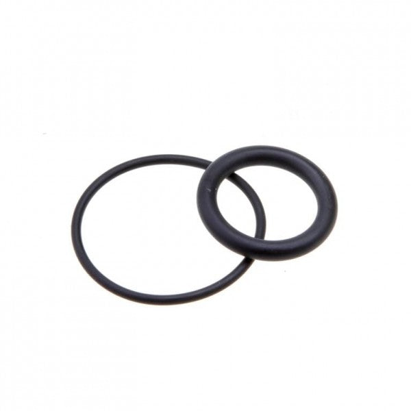 Two black O-rings from the Leybold North America Seal Kit for Right Angle-/Straight Through Valve DN 16 ISO-KF are placed against a plain white background. The smaller, thicker ring partially overlaps with the larger, thinner ring.