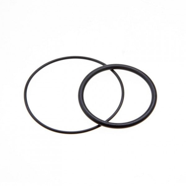 Two black rubber O-rings, belonging to the Leybold North America Seal Kit for Right Angle-/Straight Through Valve DN 50 ISO-KF, rest against a plain white background. One ring is slightly larger than the other, both circular and flat—ideal components for use with an ISO-KF right angle or straight-through valve.