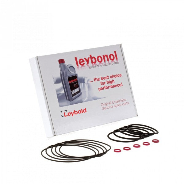 A package from Leybold North America contains a Seal Kit for the Right Angle Valve DN 100 ISO-K, featuring black and red rubber O-rings. Accompanying this is a bottle of Leybonol oil prominently labeled with "the best choice for high performance.