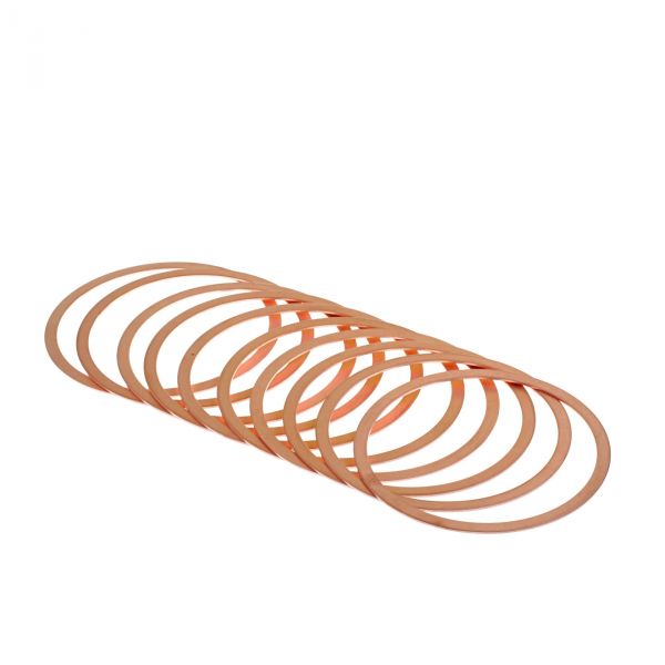 A cluster of Leybold North America's Copper Gaskets for CF Flanges DN 160 CF, resembling brown rubber bands, is artfully arranged on a white backdrop. The gaskets overlap, forming a complex pattern.