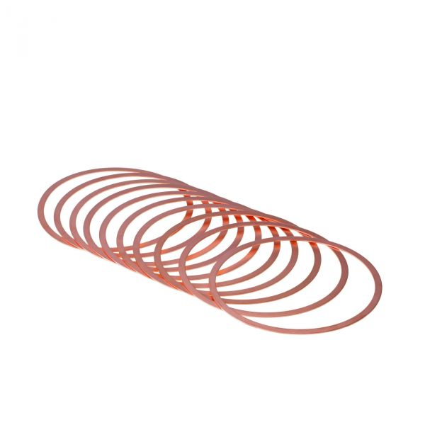 A set of thin, circular Copper Gaskets for CF Flanges DN 200 CF by Leybold North America is arranged in a fanned-out, overlapping formation on a white background, designed for high-vacuum applications.