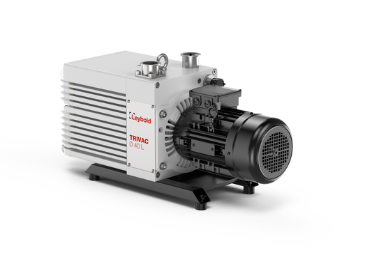Image of a Leybold TRIVAC D 40 L. The device has a robust rectangular body with cooling fins on the side, multiple valves and connectors on the top, and is mounted on a base with rubber feet. The motor is attached on the right side.