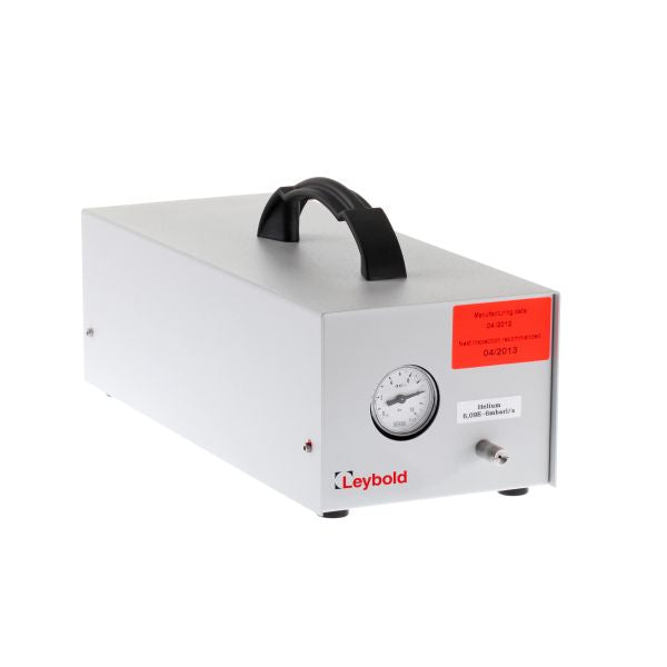 The Leybold North America S-TL 6 Sniffer Test Leak with Helium Gas Reservoir is a rectangular white device with a black top handle, analog gauge, front metal switch, and red manufacturing sticker on the side, shown on a white background.