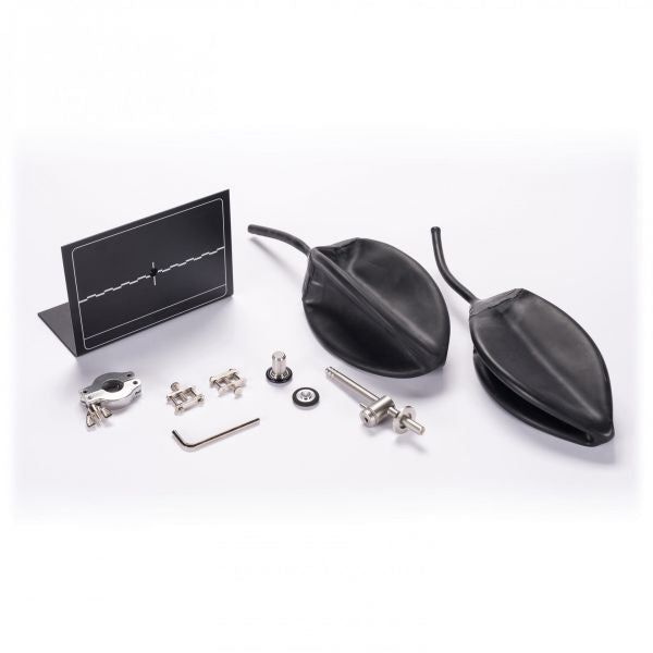 The product, "Test Leak in Pin Type Casing and Hose Nozzle - 0.5 - 1E-7mbarl/s" by Leybold North America, is displayed on a white background, featuring a black stand with a line pattern, two black inflatable bladder bags for leak detection, along with an assortment of small metal components and tools intended for quality control.