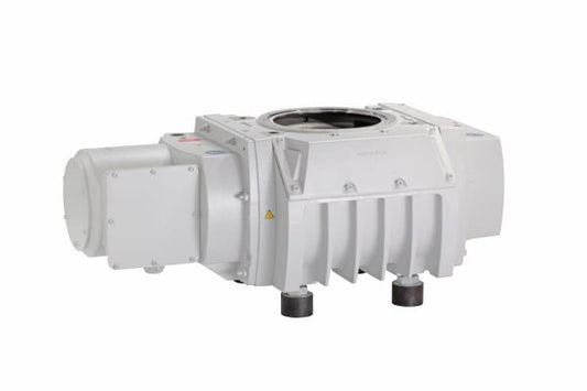 The RUVAC WHU 2500 by Leybold North America is a large, industrial, white-colored mechanical device featuring a rectangular body with multiple ridges and a circular opening on top. It includes a connection point on one side and rests on two cylindrical supports.