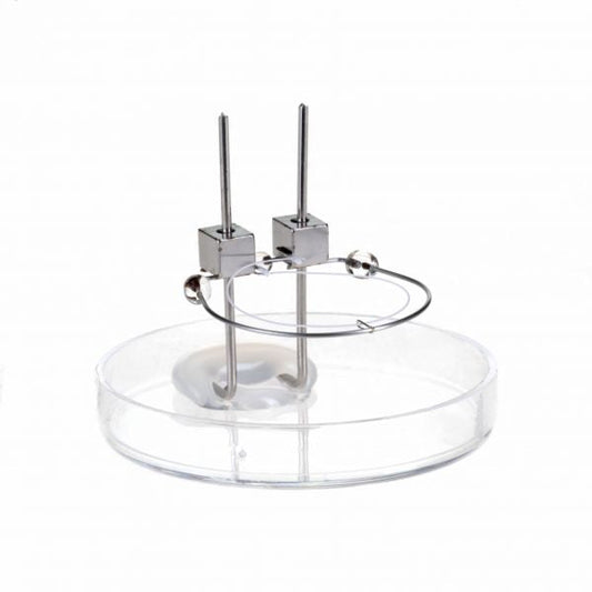 A Replacement Cathode for IE 511 / IE 514 by Leybold North America, positioned on a transparent circular stand. The design is sleek and modern, showcasing a minimalistic aesthetic that excels in functionality. The metallic finish complements the clear stand, providing an efficient contemporary appearance.
