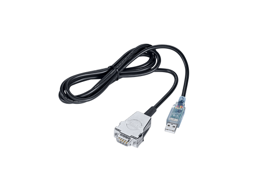 Image of a black Interface Cable RS485/USB,1,8m by Leybold North America with a metal DB9 connector on one end and a transparent blue USB connector on the other end. The cable is slightly coiled, highlighting its length and flexibility.