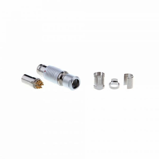 Shown disassembled against a white background, the Leybold North America Feedthrough Plug 9 pins - Atmosphere Side includes the connector body, 9-pin feedthrough section, two metal rings, and a cylindrical sleeve—ideal for vacuum systems.