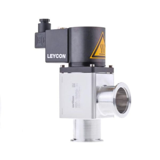 This ISO-KF Right Angle Valve, electromagnetically operated and branded Leybold North America, features a black component labeled "LEYCON" on top. The lower section includes metallic cylindrical connections attached to a square-shaped module, with a yellow caution triangle displaying wavy lines on the black part to indicate heat warning.