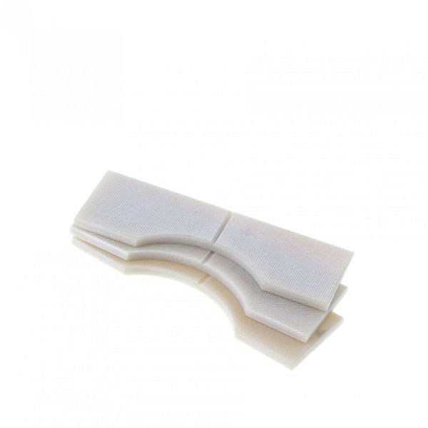 A small, white plastic object with a curved, segmented design is isolated against a white background. The item appears to be made up of several interlocking pieces, creating a smooth, symmetrical form. It resembles the Vanes SOGEVAC SV 40 B - 3 Pcs. from Leybold North America.