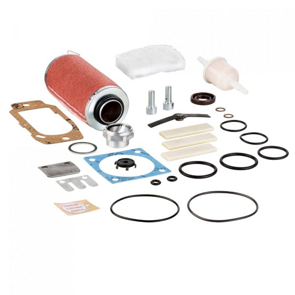 A collection of automotive parts including gaskets, O-rings, bolts, a cylindrical filter with a red exterior, a small white filter, and various other components arranged on a white background has been replaced by the Repair Kit SOGEVAC SV 10 B / SV 16 B from Leybold North America.