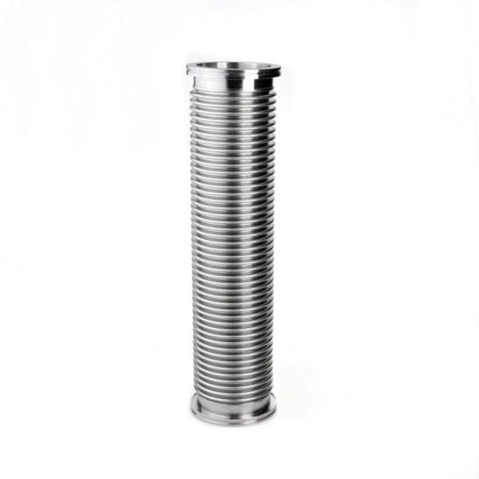 A silver cylindrical ribbed metal pipe, similar to industrial vacuum hoses, stands vertically against a white background. The pipe features evenly spaced ridges along its length and flat ends indicating compatibility with ISO-K flanges. It is Leybold North America's "Vacuum Hoses With Flanges DN 100 ISO-K (500 mm).