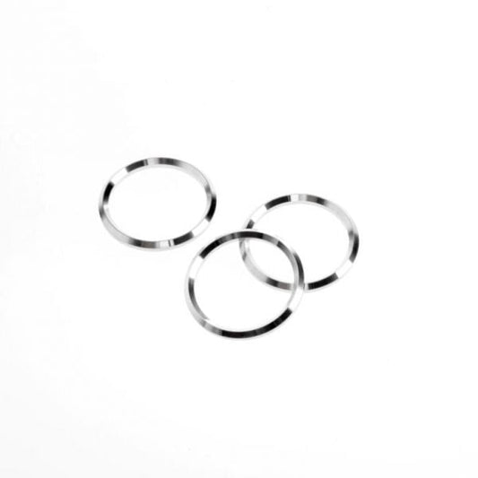 Three thin, silver Leybold North America Ultra Sealing Rings DN 20/25 ISO-KF rest on a white surface, two touching and one slightly apart—ideal components for ISO-KF vacuum systems.