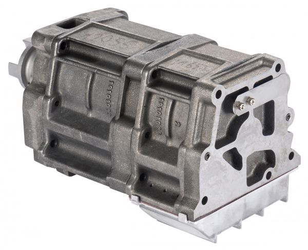 A rectangular, metallic automotive part with intricate detailing and multiple bolt holes on its sides and front face. The component appears to be part of an engine or transmission system, featuring various ridges and grooves for structural support and attachment, similar to the Vacuum Generator Module TRIVAC D 65 B by Leybold North America.