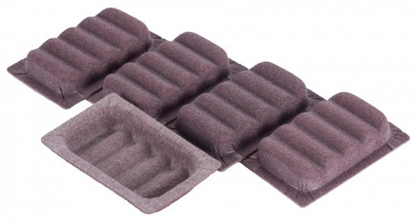 An elongated brown carton tray with four raised, curved compartments. The second compartment from the left is detached and positioned slightly in front of the others, highlighting the wavy, ridged texture of all compartments containing the Internal Demister TRIVAC D 16 B (5 pcs.) by Leybold North America.