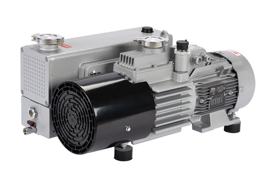 A Leybold NEO D65 with a grey body and black cylindrical component. The pump features various valve connections and bolts, with detailed ridges and an attached motor. It sits on small rubber feet for stability.