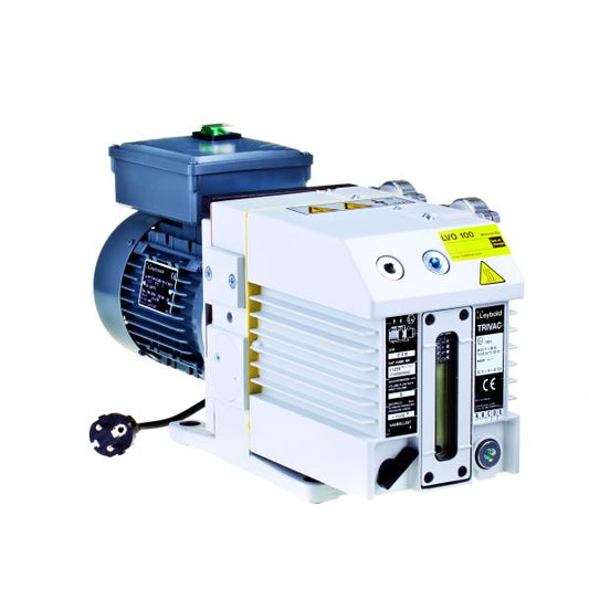 A Leybold TRIVAC D 8 B vacuum pump with a white and gray exterior, featuring a control panel, multiple ports, and a built-in gauge on the side. The pump is connected to a black power cord and has labeling and warning stickers near the top.