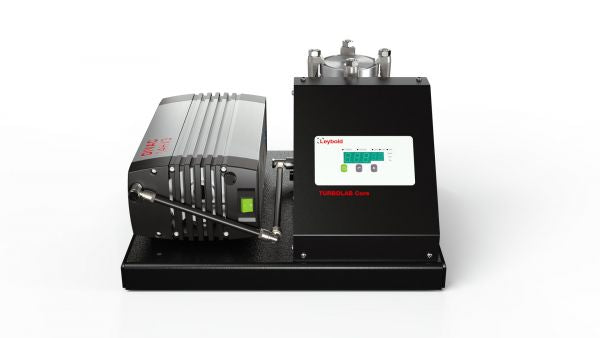 A vacuum pump system with a digital interface, featuring the TURBOLAB Core 90 i from Leybold North America. The setup includes a gray turbo pump with a green indicator light on the left and a black control box with a digital display and buttons on the right, mounted on a black base. The logo "Leybold" is visible.