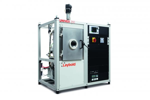 The Leybold North America HV-experimentation system UNIVEX 250 is a vacuum coating system featuring a control panel on the right side, along with various cables and components. It boasts a white and black exterior, showcasing the main chamber door in the center. This machine is utilized for advanced material processing.