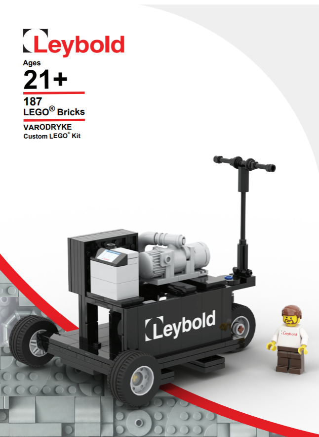 Introducing the exclusive Limited Edition VARODRYKE LEGO brick set for ages 21+ by Leybold North America Shop. This unique kit includes 187 bricks, a mini-figure in a Leybold shirt, and features a wheeled cart with intricate machinery and handlebar—ideal for enthusiasts seeking something special.