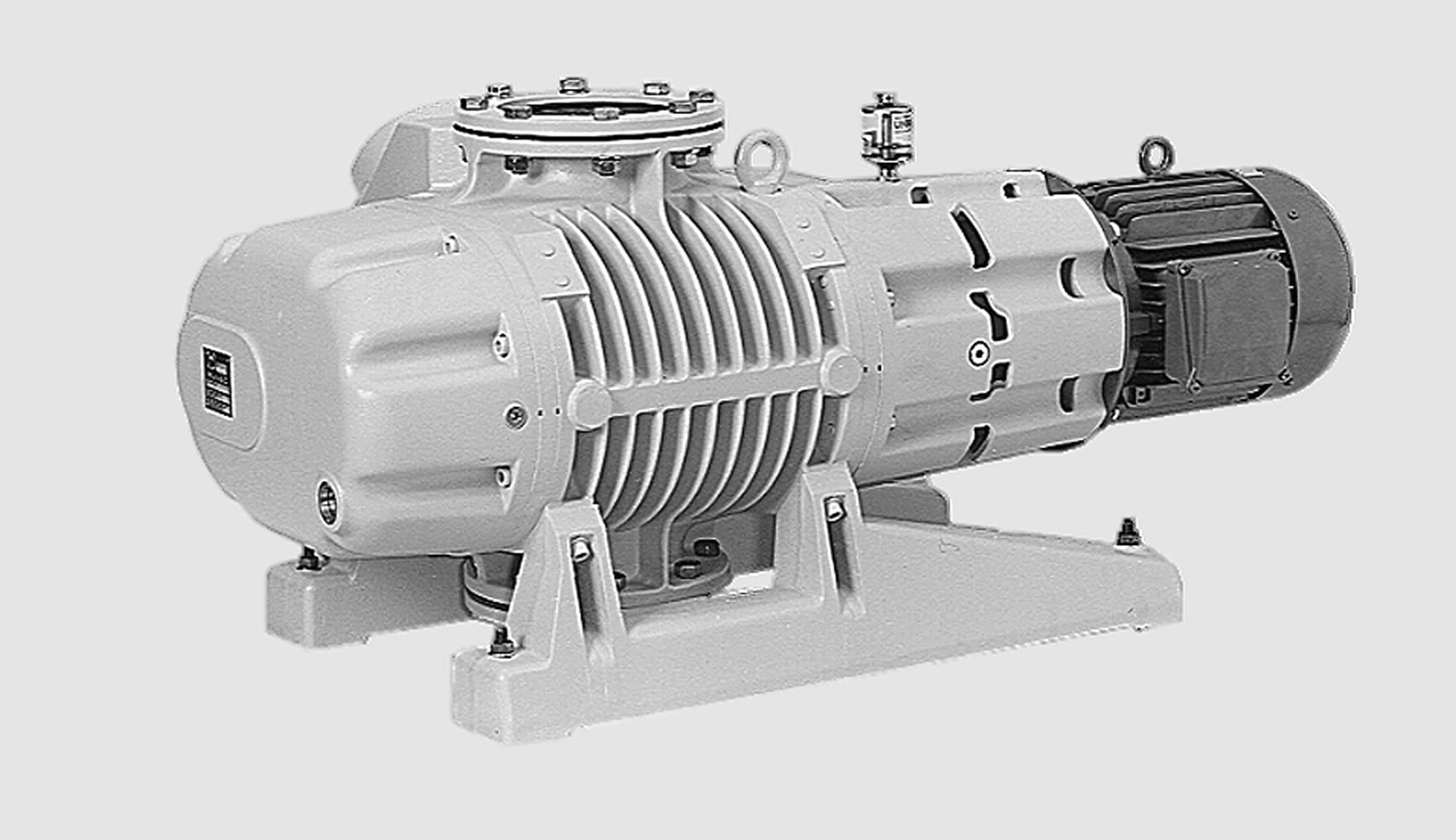 A grayscale image of a Leybold RUVAC WAU 251 industrial vacuum pump. The pump has a cylindrical body with multiple horizontal ridges, mounted on a sturdy base, and is connected to a motor on the right side. It features several bolts, ports, and connectors for secure operation.