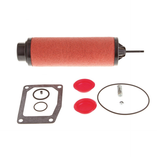 A cylindrical red fuel filter is laid horizontally on a white background. Surrounding it are a black gasket, three O-rings, a small spring, two red plastic caps, and a black metal rod. The components are arranged neatly around the Service Kit SOGEVAC SV 65 B by Leybold.