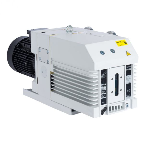 A white and black Leybold TRIVAC D 65 B industrial vacuum pump with cooling fins, various warning labels, and operational panels. The unit is rectangular with a cylindrical motor housing at one end and multiple connection points. It rests on a flat base.